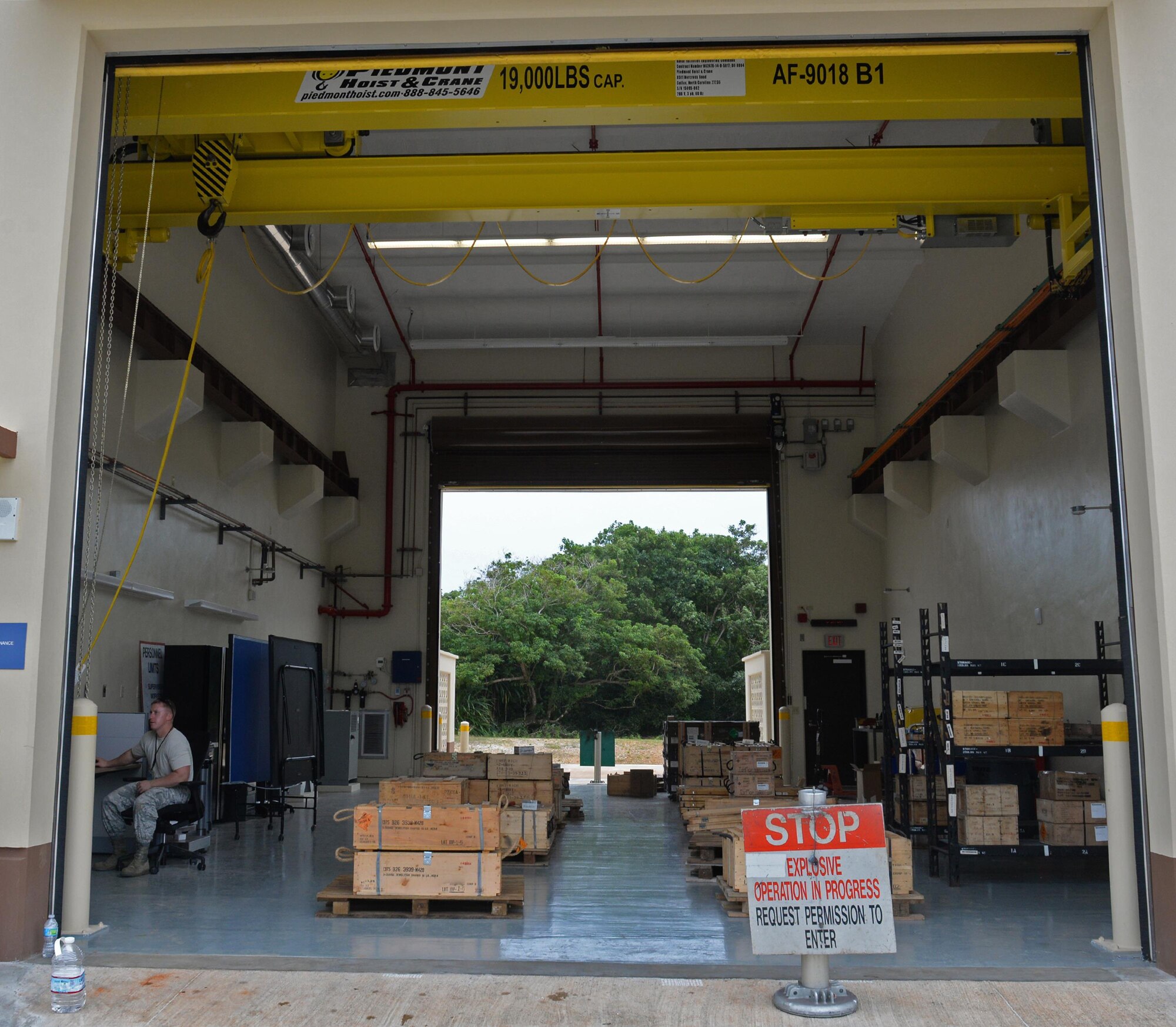 U.S. Air Force Staff Sgt. Jason Clapp, 36th Munitions Squadron, inspection team member, reviews inspection documents Jan. 26, 2017, at Andersen Air Force Base, Guam. The 36th MUNS recently opened their new precision-guided munitions shop in early January 2017, where Airmen test, inspect and update missiles to make sure they are mission-ready. (U.S. Air Force photo by Senior Airman Alexa Ann Henderson)