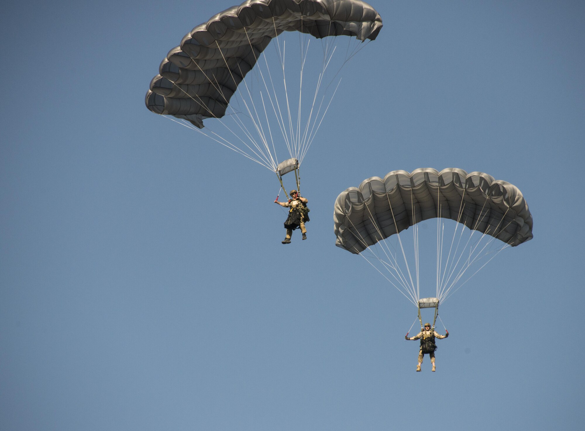 U.S. Air Force combat controllers from the 320th Special Tactics Squadron conduct jump operations from a U.S. Air Force MC-130J Commando II assigned to the 17th Special Operations Squadron, Feb. 16, 2017 at Chandy Range, Thailand. Executing jump operations throughout Cobra Gold 2017, the members of the 320th STS and Royal Thai Air Force Special Operations Regiment demonstrated the strength of a partnership that has evolved over the last 17 years. (U.S. Air Force photo by Capt. Jessica Tait)