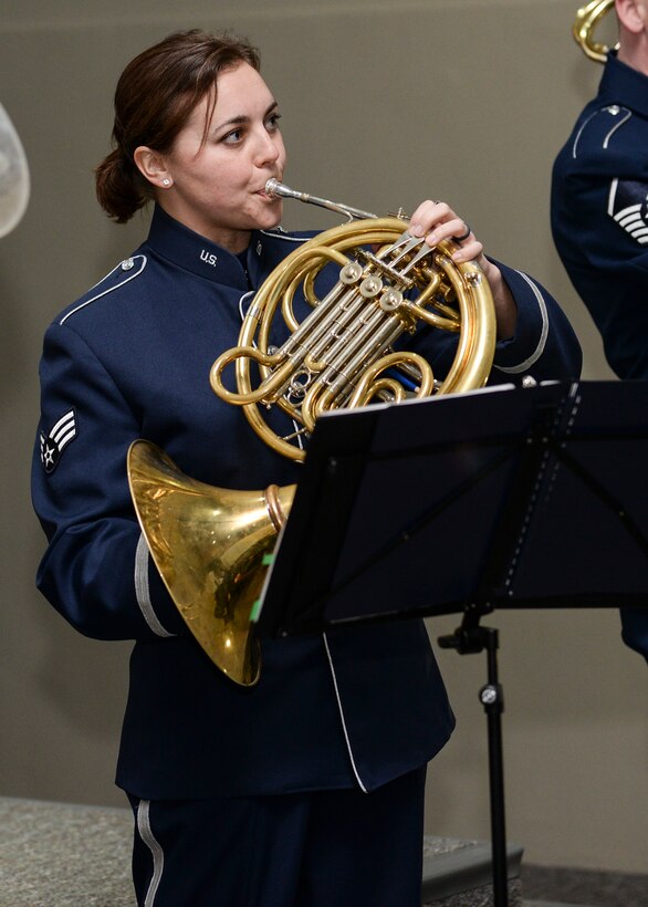 Senior Airman Alena Zidlicky, a musician assigned to Offutt Brass, the brass ensemble of the U.S. Air Force Heartland of America Band, plays her French horn during a performance at Mount Rushmore, S.D., Feb. 20, 2017. Offutt Brass will perform throughout western South Dakota, playing music from classical to jazz as well as patriotic tunes. (U.S. Air Force photo by Senior Airman Anania Tekurio)