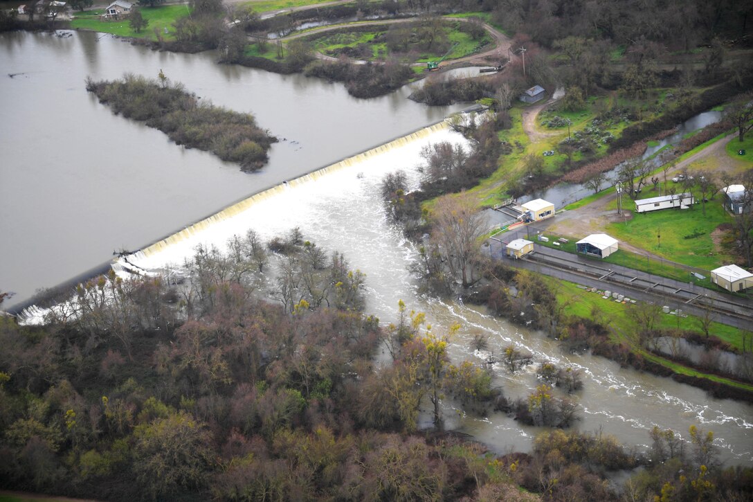 Aerial shot of flood damage near a spillway over Merced County, Merced, Calif., Feb. 19, 2017, taken by Army National Guard Sgt. 1st Class Marty Ortiz from inside a UH-72 Lakota helicopter. Ortiz is assigned to the California Army National Guard’s 1st Battalion, 140th Air Assault Regiment. Air National Guard photo by Senior Airman Daniel Crosier