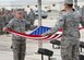 An Al Udeid Air Base Honor Guard team folds the U.S. flag during a Presidents Day retreat ceremony at Al Udeid AB, Qatar, Feb. 20, 2017. The ceremony honored the lives and contributions of the Presidents of the United States, both past and present. (U.S. Air Force photo by Senior Airman Miles Wilson)