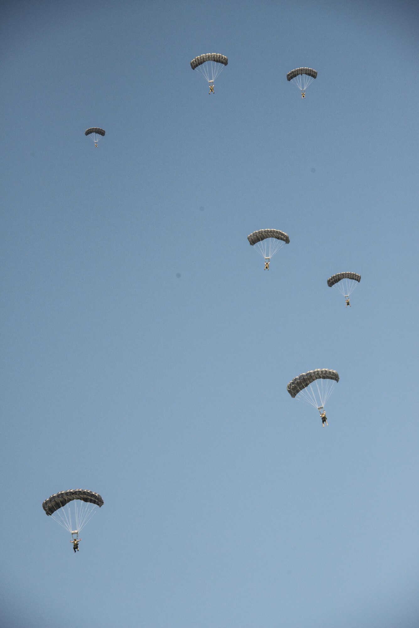 U.S. Air Force combat controllers from the 320th Special Tactics Squadron and counterparts from the Royal Thai Air Force Special Operations Regiment conduct military free-fall jump operations from a U.S. Air Force MC-130J Commando II assigned to the 17th Special Operations Squadron, Feb. 16, 2017 at Chandy Range, Thailand. Exchanging knowledge and procedures with host nation partners helps to develop a combined and integrated capability. (U.S. Air Force photo by Capt. Jessica Tait)