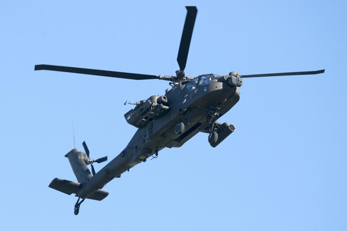 An AH-64 Apache attack helicopter conducts flight operations at Travis Air Force Base, Calif., Jan, 6, 2017. This aircraft is the U.S. Army’s heavy division/corps attack helicopter.  The AH-64 Apache is a four-blade attack helicopter with reverse-tricycle landing gear, and features a tandem cockpit for a crew of two. Air Force photo by Heide Couch