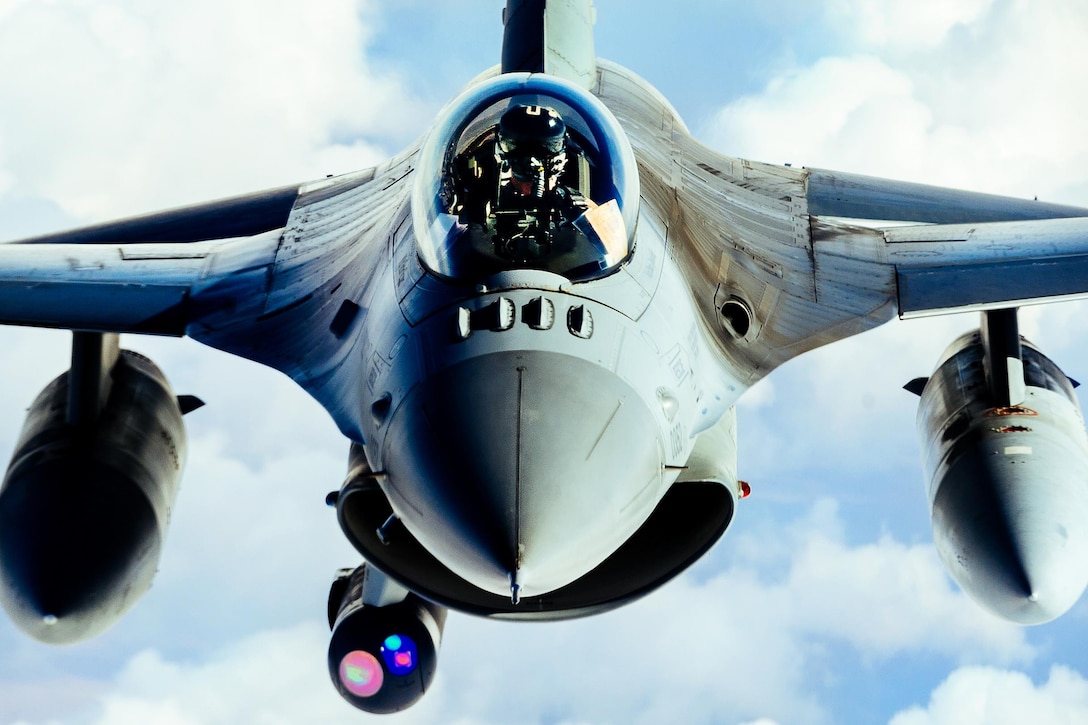 An Air Force F-16 Fighting Falcon refuels from a KC-135 Stratotanker in support of Operation Inherent Resolve, Feb. 15, 2017. The air crew is assigned to the 340th Expeditionary Air Refueling Squadron. They support the fight against Islamic State of Iraq and Syria terrorists by delivering fuel to U.S. Air Force F-16 Fighting Falcons, A-10 Thunderbolt IIs and a B-52 Stratofortress. Air Force photo by Senior Airman Jordan Castelan