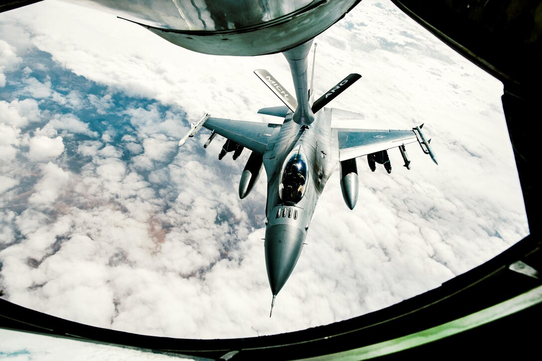 An Air Force F-16 Fighting Falcon refuels from a KC-135 Stratotanker supporting Operation Inherent Resolve, Feb. 15, 2017. Air Force photo by Senior Airman Jordan Castelan 