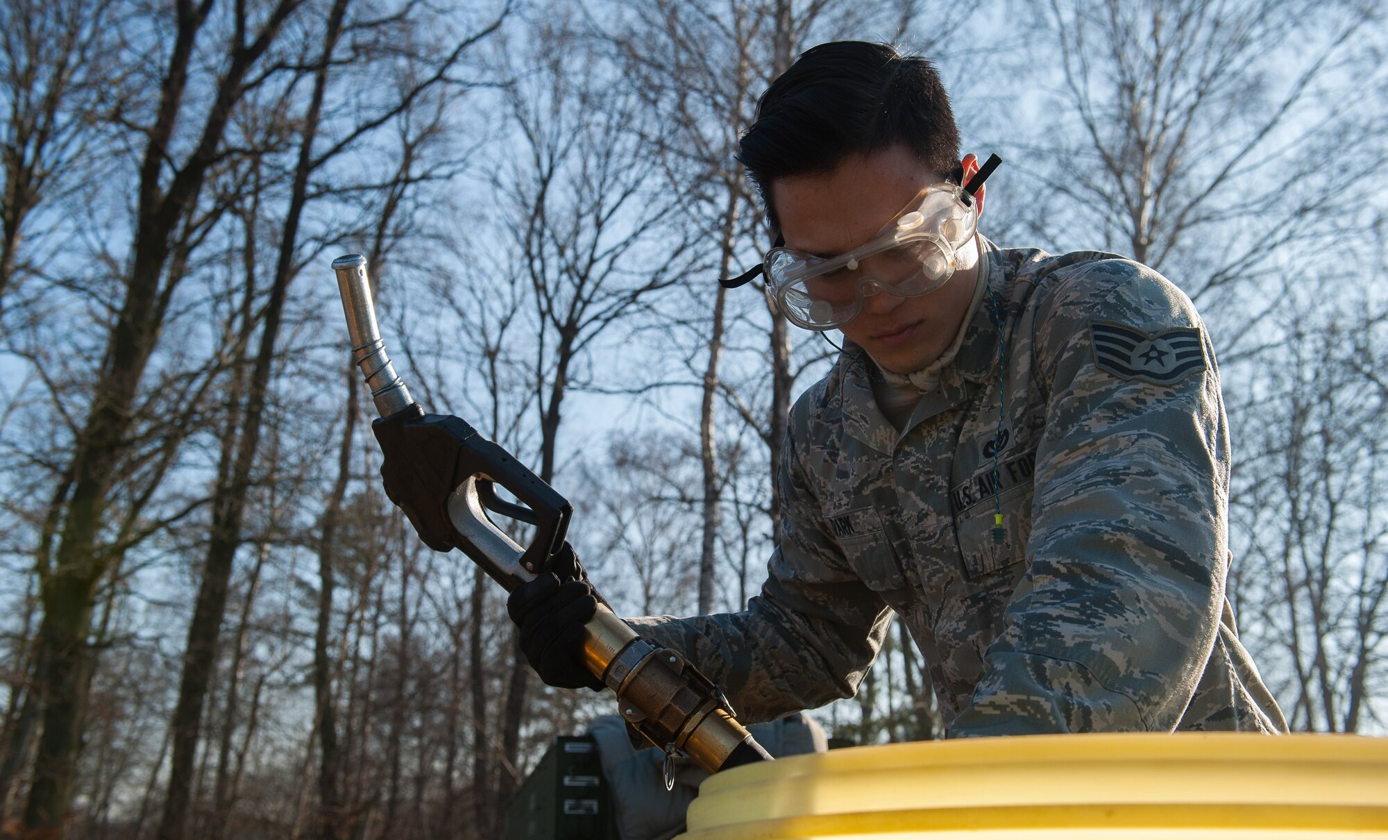Staff Sgt. Ju Ho Park, 1st Combat Communications Squadron electrical power production craftsman, pumps fuel from a barrel into a power generator during a training exercise on Ramstein Air Base, Germany, Feb. 16, 2017. The 1 CBCS is part of the 435th Air and Space Communications Group, which provides its major command’s only combat communications support for all of the North Atlantic Treaty Organization. (U.S. Air Force photo by Senior Airman Lane T. Plummer)