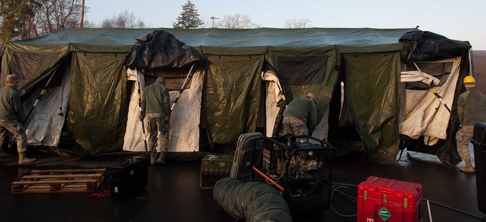 Airmen from the 1st Combat Communications Squadron wrap up a mock-deployment exercise on Ramstein Air Base, Germany, Feb. 17, 2017. The 1 CBCS is part of the 435th Air and Space Communications Group, which provides its major command’s only combat communications support for all of the North Atlantic Treaty Organization. Activated in 1952, the 1 CBCS changed bases five times before arriving at Ramstein July 1, 1994. (U.S. Air Force photo by Senior Airman Lane T. Plummer)