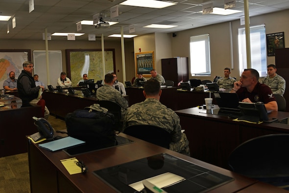 Teams from across the Air Force discuss logistics during an integration meeting at Shaw Air Force Base, S.C., Feb. 15, 2017. The surveyors visited Shaw after it was chosen as one of eight potential candidates for a Battlefield Airman schoolhouse. (U.S. Air Force photo by Airman 1st Class Destinee Sweeney)