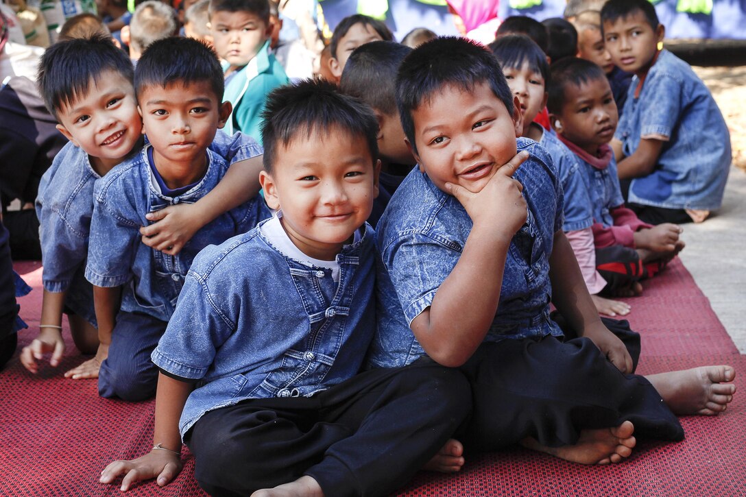 Children attend an assembly during exercise Cobra Gold in Ban Non Lueam, Thailand, Feb. 17, 2017. Marine Corps photo by Lance Cpl. Maximiliano Rosas