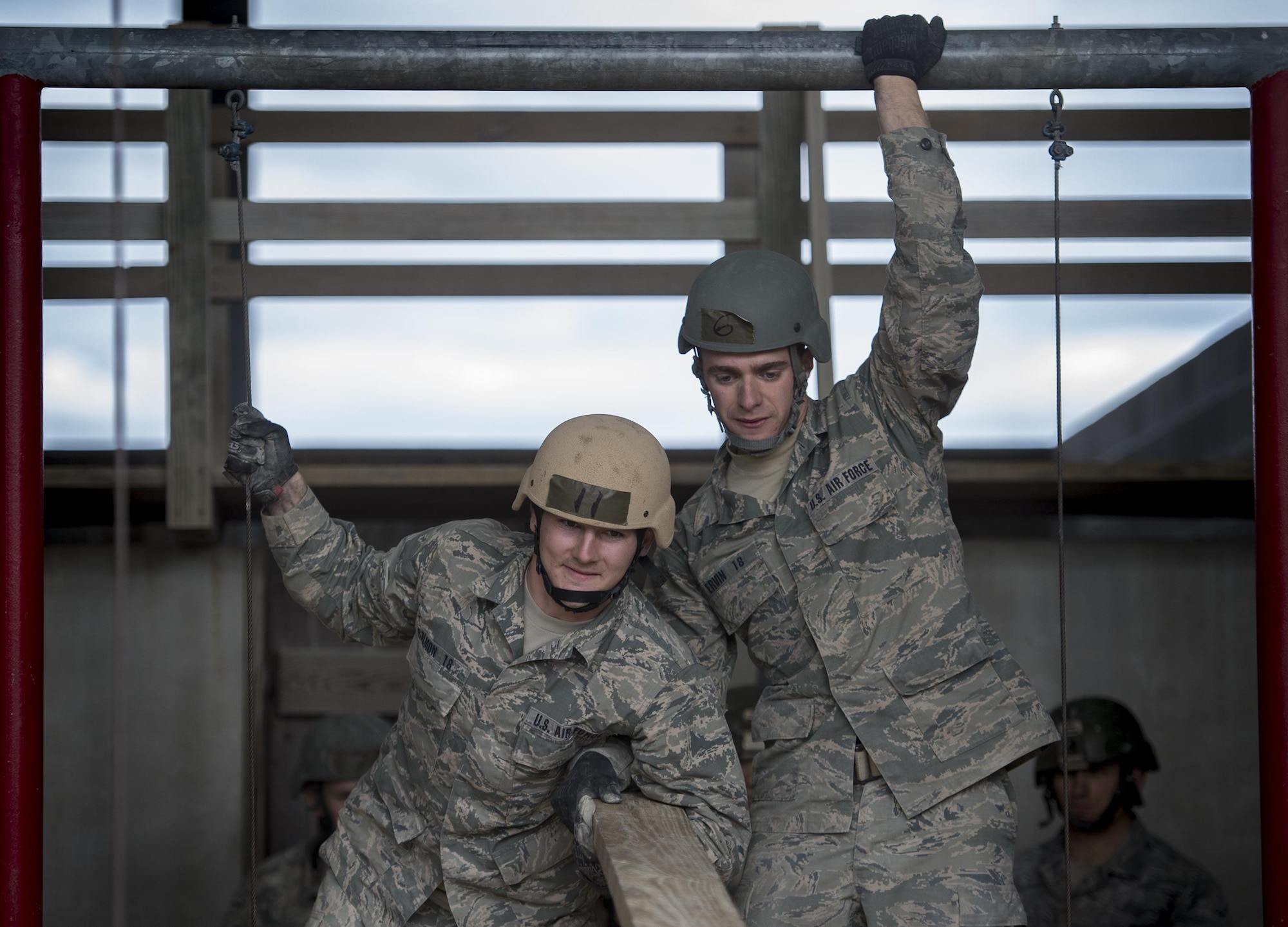 U.S. Air Force Academy cadets participate in a skills building task during the Air Liaison Officer Aptitude Assessment, Feb. 14, at Camp Bullis, Texas. The cadets were forced to use critical thinking skills to complete tasked obstacles as a team. (U.S. Air Force photo by Tech. Sgt. Zachary Wolf)