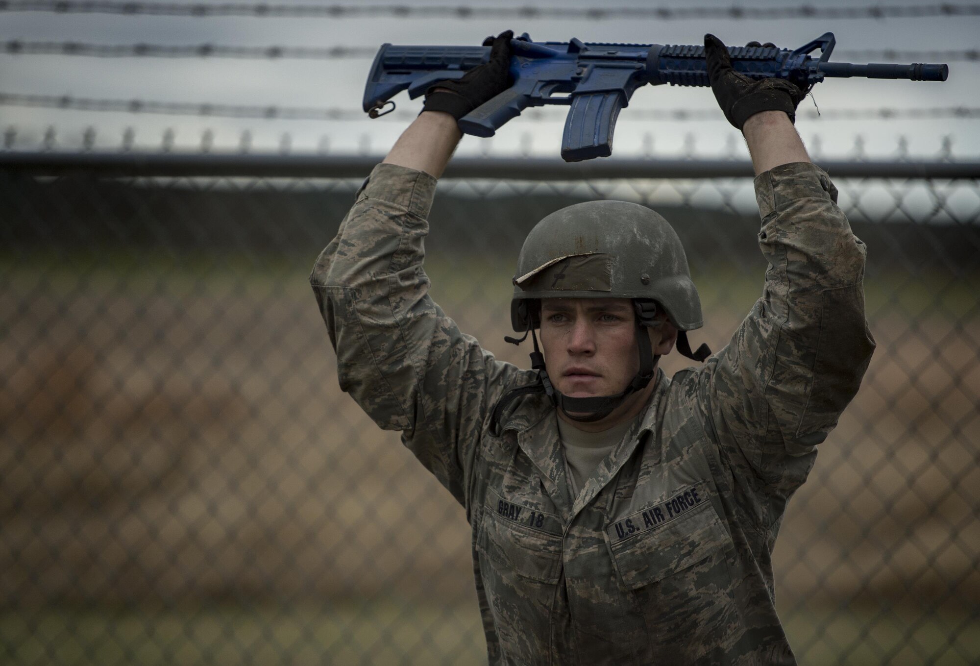 U.S. Air Force Academy Cadet Parker Gray does a squat during the Air Liaison Officer Aptitude Assessment, Feb. 14, at Camp Bullis, Texas. The week-long assessment allows current ALOs and enlisted cadre to decide if the cadets are worthy of progressing to the Tactical Air Control Party school house. (U.S. Air Force photo by Tech. Sgt. Zachary Wolf)