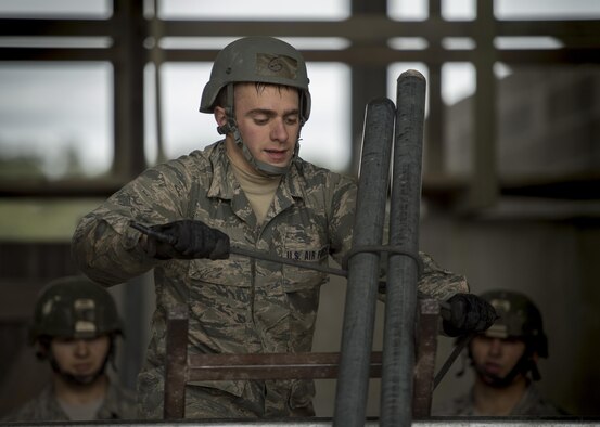 U.S. Air Force Academy Cadet Colton Ervin participate in a skills building task during the Air Liaison Officer Aptitude Assessment, Feb. 14, at Camp Bullis, Texas. The cadets were forced to use critical thinking skills to complete tasked obstacles as a team. (U.S. Air Force photo by Tech. Sgt. Zachary Wolf)