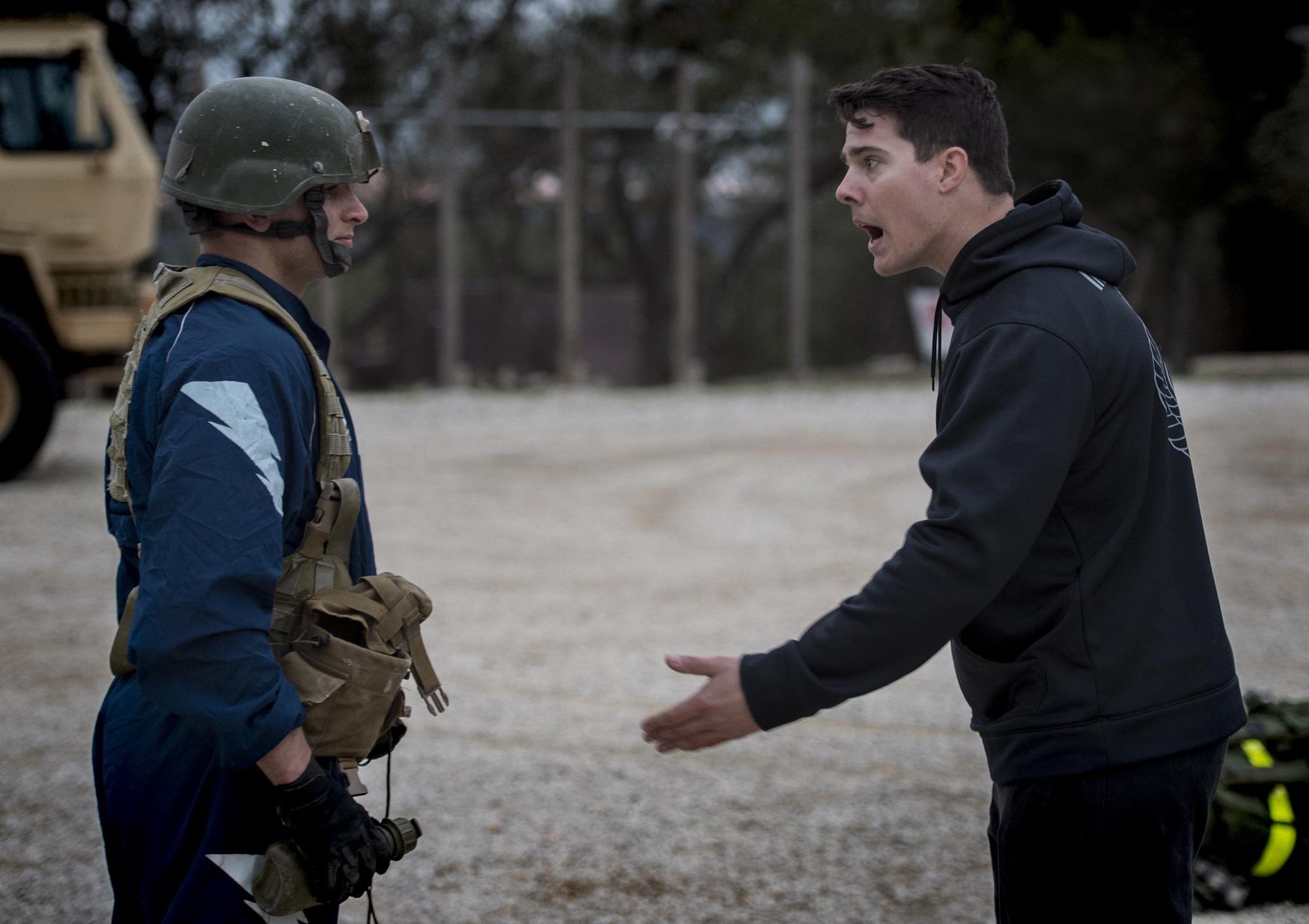 Staff Sgt. Daniel Clark, 553d Battlefield Airmen Training Squadron Tactical Air Control Party instructor, yells at U.S. Air Force Academy Cadet Bowman Benge during the Air Liaison Officer Aptitude Assessment, Feb. 14, at Camp Bullis, Texas. The week-long assessment allows current ALOs and enlisted cadre to decide if the cadets are worthy of progressing to the Tactical Air Control Party school house. (U.S. Air Force photo by Tech. Sgt. Zachary Wolf)