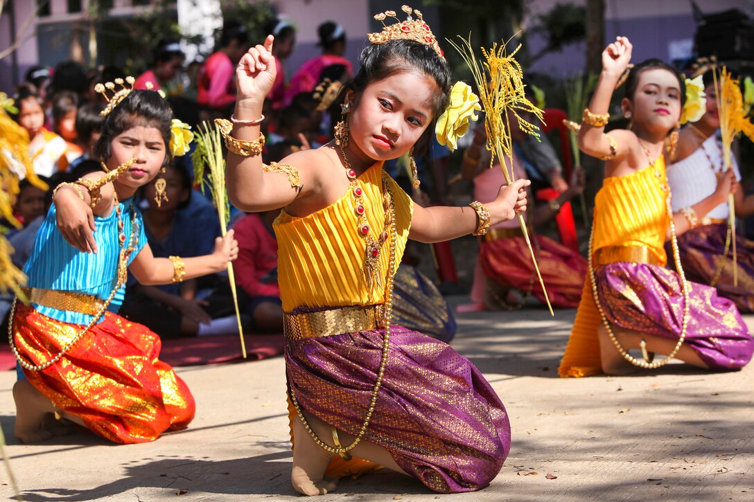 Thai children perform a traditional dance at an assembly for service members from the U.S., Thailand, South Korea, India and China during exercise Cobra Gold in Ban Non Lueam, Thailand, Feb. 17, 2017. Marine Corps photo by Lance Cpl. Maximiliano Rosas