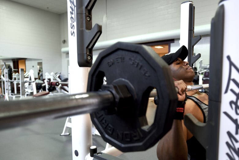 PETERSON AIR FORCE BASE, Colo. – Senior Airman Garth Salmon, 21st Force Support Squadron fitness specialist, lifts weights on the incline bench at the Fitness Center on Peterson Air Force Base, Colo., Feb. 15, 2017. Salmon began his journey into the world of physical fitness when he arrived at Peterson AFB. (U.S. Air Force photo by Airman 1st Class Dennis Hoffman)