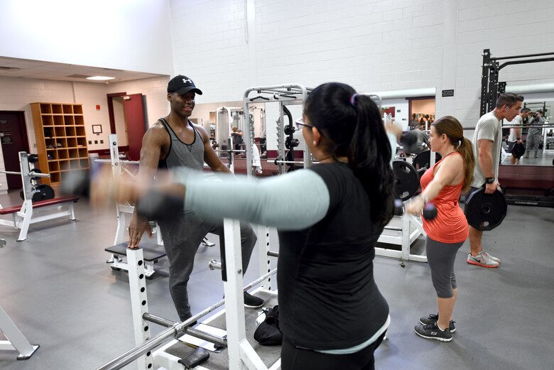 PETERSON AIR FORCE BASE, Colo. – Senior Airman Garth Salmon, 21st Force Support Squadron fitness specialist, leads his Total Body Sculpting class at the Fitness Center on Peterson Air Force Base, Colo., Feb. 15, 2017. The free class is open to all Team Pete service members and their family. (U.S. Air Force photo by Airman 1st Class Dennis Hoffman)