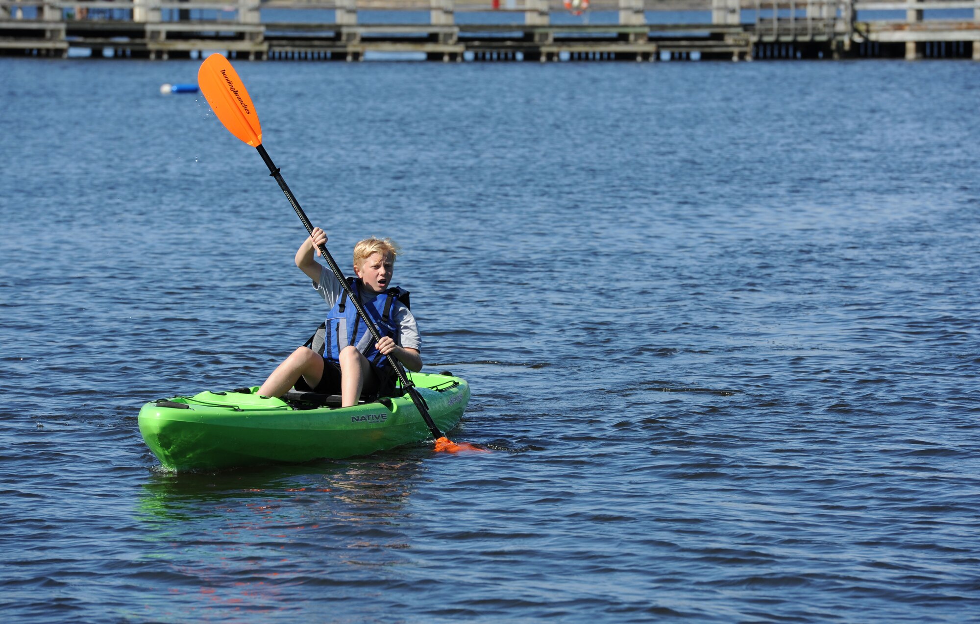 Cy Smith, son of Col. C. Mike Smith, 81st Training Wing vice commander, steers his kayak through the Keesler Marina during the Polar Bear Regatta at Marina Park Feb. 18, 2017, on Keesler Air Force Base, Miss. Keesler Outdoor Recreation sponsored the event, providing kayaks and paddle boards for use. (U.S. Air Force photo by Kemberly Groue)