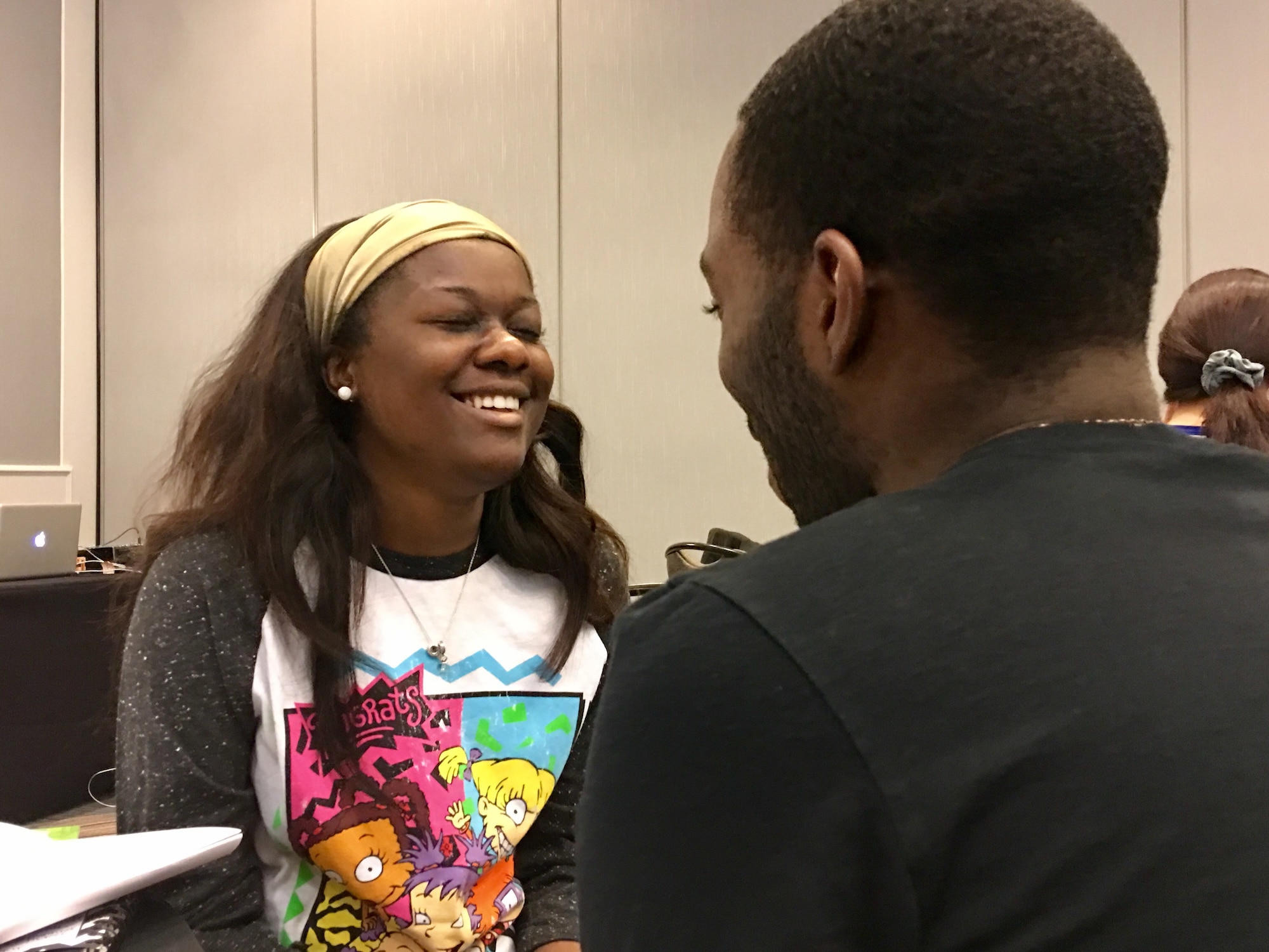 Angelique Hopkins laughs during “knees-to-knees” with her husband, Senior Airman John Hopkins, 50th Security Forces Squadron, during the Center for Relationship Education military marriage retreat in Denver, Colorado, Sunday, Feb. 19, 2017. The Hopkins’ performed “knees-to-knees” and other exercises throughout the weekend to grow in intimacy and communication. (U.S. Air Force photo/1st Lt. Darren Domingo)