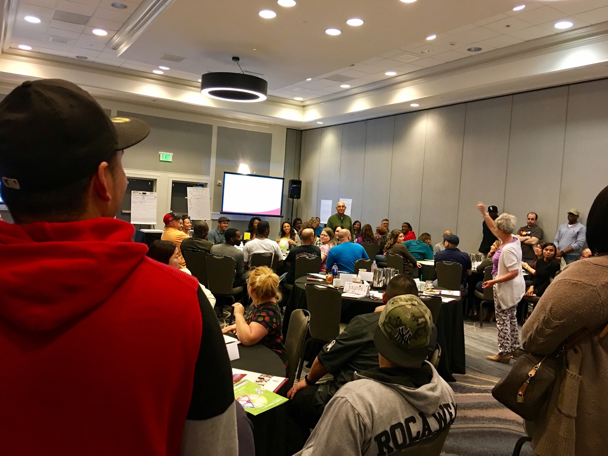 Couples engage in a personality discussion during the Center for Relationship Education military marriage retreat in Denver, Colorado, Saturday, Feb. 18, 2017. The exercise tool broke attendees into six different color groups to help each other understand interpersonal skill and relationship strengths. (U.S. Air Force photo/1st Lt. Darren Domingo)