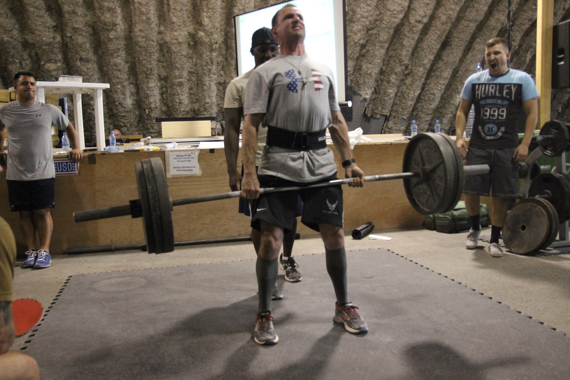 Shortly before his cancer diagnosis, Senior Airman Cameron Sowle competes in a weightlifting competition during his deployment in Oct 2015 (Courtesy Photo). 