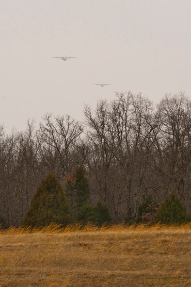 Two C-130J Super Hercules approach the Black Jack Drop Zone Feb. 11, 2017, during a training mission near Beebe, Ark. Two aircrews from the 327th Airlift Squadron competed against each other, attempting to drop their cargo closest to a designated target. (U.S. Air Force photo by Master Sgt. Jeff Walston/Released)