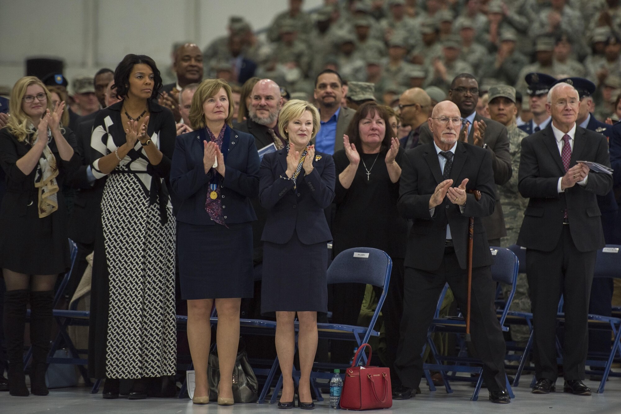 Audience members give an applause during the Chief Master Sergeant of the Air Force Retirement and Appointment Ceremony at Joint Base Andrews, Md., Feb. 16, 2017. During the event, Chief Master Sgt. of the Air Force James A. Cody was retired and Chief Master Sgt. Kaleth O. Wright was appointed the 18th Chief Master Sgt. of the Air Force. (U.S. Air Force photo by Airman 1st Class Valentina Lopez)