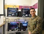 U.S. Marine Corps 2nd Lt. Ben Lacount works on an ammunition rounds counter in the Manufacturing and Knowledge Lab at Naval Surface Warfare Center, Carderock Division in West Bethesda, Md., Dec. 19, 2016. Carderock's Additive Manufacturing Project Office, along with the Corrosion and Coatings Engineering Branch, have partnered to provide support for the Marine Corps Innovation Challenge. 