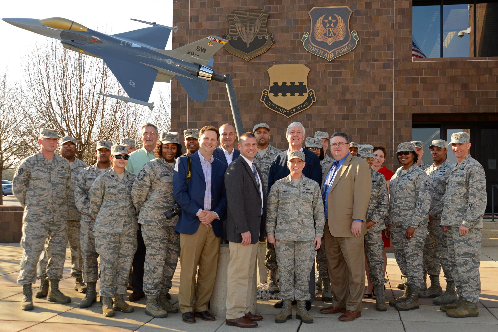 U.S. Air Force Staff Sgt. Angela Duff, 20th Logistics Readiness Squadron quality assurance evaluator, center right, stands with Team Shaw members and Sumter community leaders at Shaw Air Force Base, S.C., Feb. 14, 2017. The Greater Sumter Chamber of Commerce Military Affairs committee recognized Duff as the 2016 Military Citizen of the Year for outstanding merit. (U.S. Air Force photo by Airman 1st Class Kathryn R.C. Reaves)