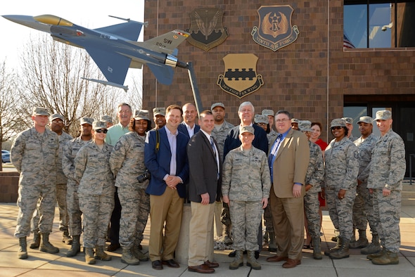 U.S. Air Force Staff Sgt. Angela Duff, 20th Logistics Readiness Squadron quality assurance evaluator, center right, stands with Team Shaw members and Sumter community leaders at Shaw Air Force Base, S.C., Feb. 14, 2017. The Greater Sumter Chamber of Commerce Military Affairs committee recognized Duff as the 2016 Military Citizen of the Year for outstanding merit. (U.S. Air Force photo by Airman 1st Class Kathryn R.C. Reaves)