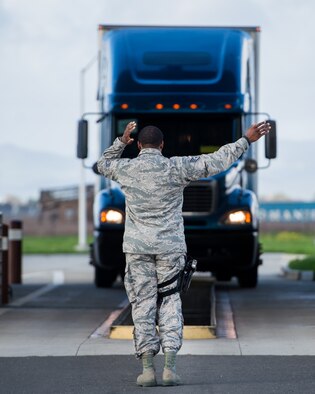 Trucks and personnel from the Federal Emergency Management Agency arrive at Travis Air Force Base, Calif., Feb. 16, 2017. Travis AFB is acting as a staging area for FEMA personnel, providing space for necessary equipment and supplies in case of the Oroville auxiliary spillway failure. (U.S. Air Force photo/Louis Briscese)