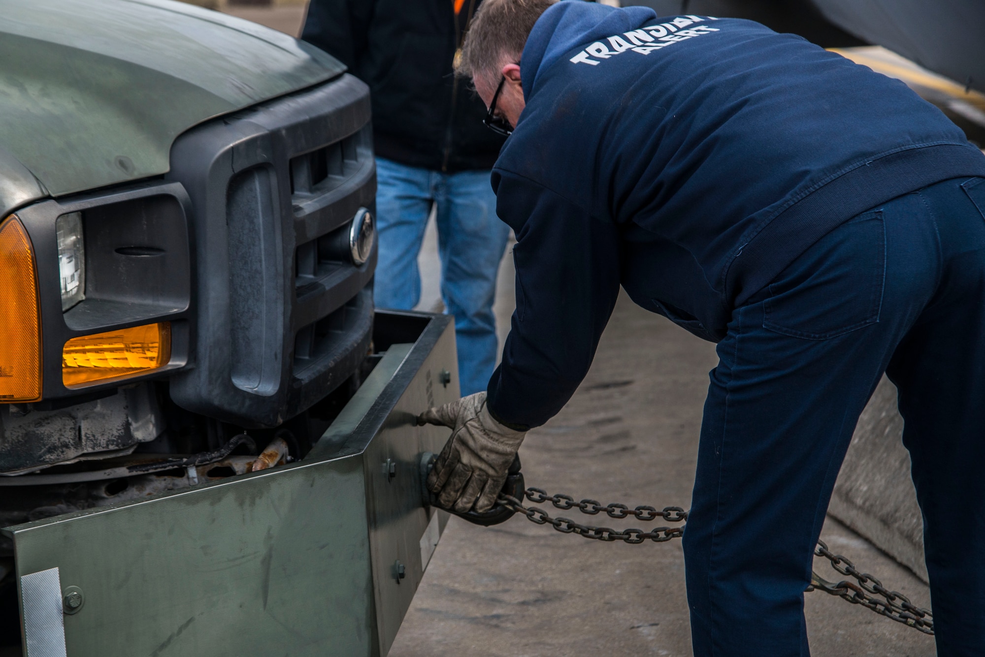 Contractors work with the military to help move The Areomedical Contractors Feb. 23, 2017 at Scott Air Force Base, Illinois . The FuT allows for hands-on muscle memory of configuration, placement of in-flight kits, electrical, oxygen, emergency exits, etc. 100% of readiness skills are completed for the Aeromedical Evacuation Technicians.  It helps provide an innovative, cost effective, improved training platform for total force AECMs and ground support personnel in terms of aircraft configuration familiarization and realistic, high-fidelity task training and mission simulation. (U.S. Air Force photos/Senior Airman Tristin English)