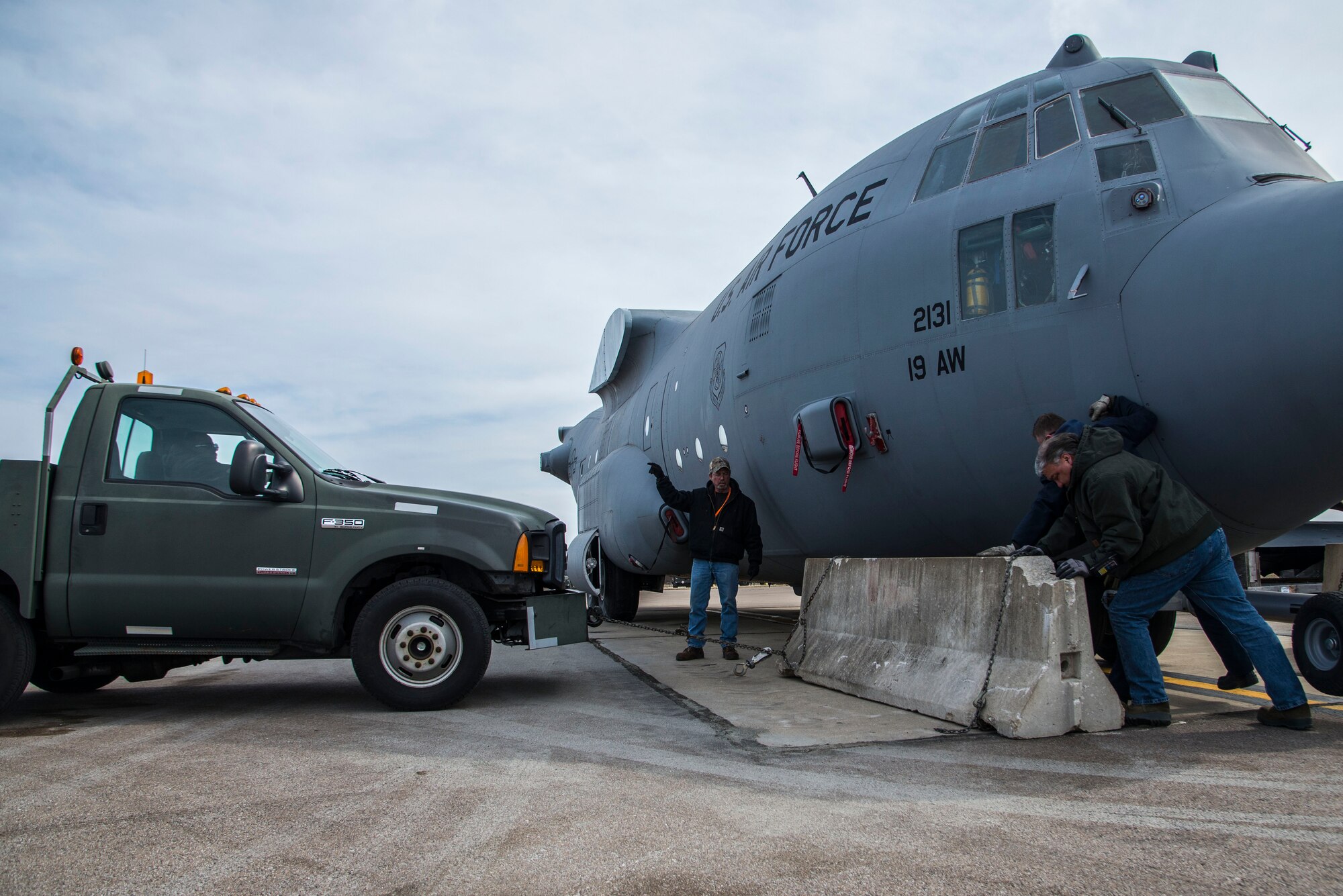 Contractors work with the military to help move The Areomedical Contractors Feb. 23, 2017 at Scott Air Force Base, Illinois . The FuT allows for hands-on muscle memory of configuration, placement of in-flight kits, electrical, oxygen, emergency exits, etc. 100% of readiness skills are completed for the Aeromedical Evacuation Technicians.  It helps provide an innovative, cost effective, improved training platform for total force AECMs and ground support personnel in terms of aircraft configuration familiarization and realistic, high-fidelity task training and mission simulation. (U.S. Air Force photos/Senior Airman Tristin English)