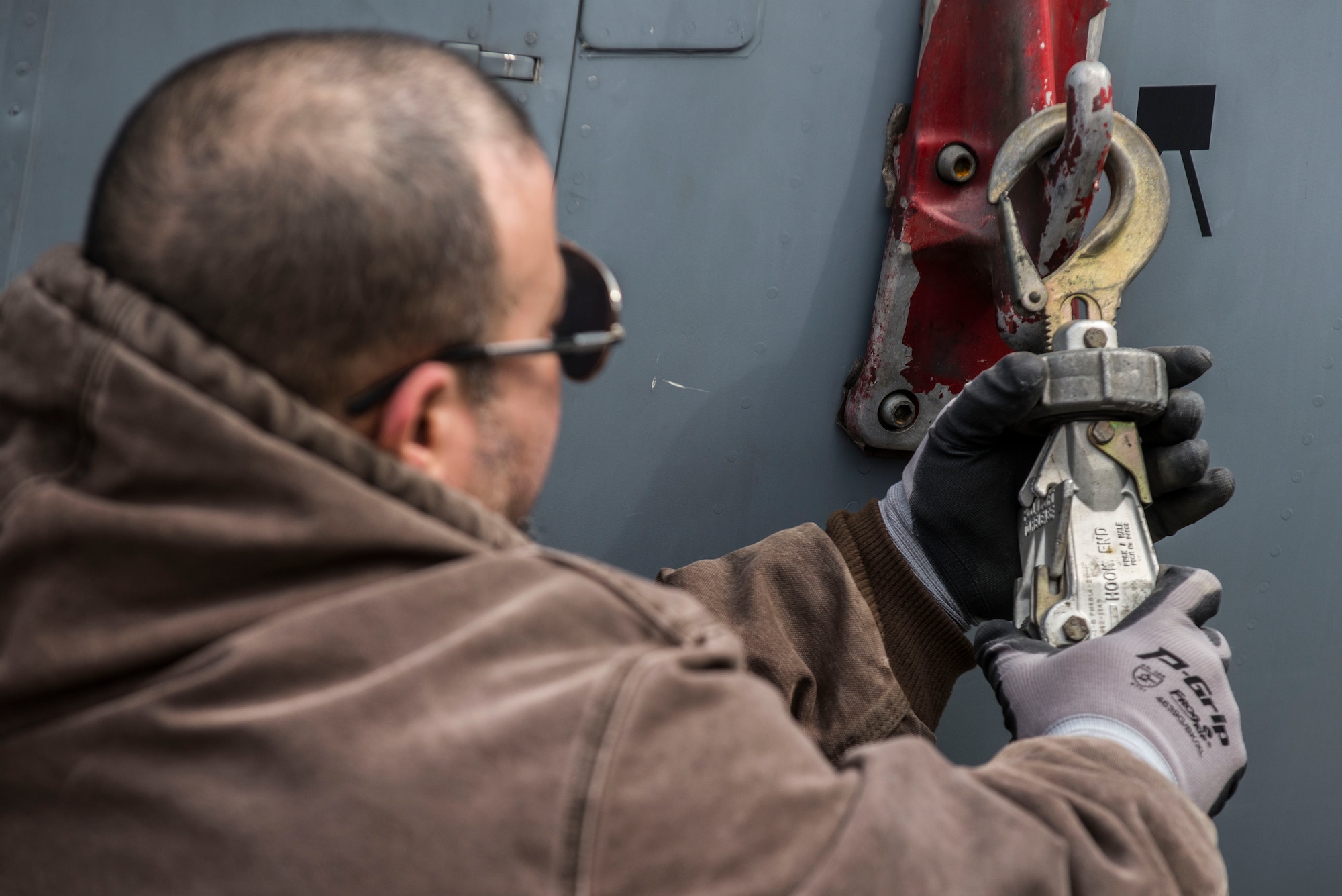 Contractors worked with the 375th Aeromedical Evacuation Squadron to help move a C-130 fuselage trainer, or FuT, which is a platform where aeromedical evacuation crews can perform 100 percent of readiness skills. It is an innovative, cost effective, improved training platform for total force AE and ground support personnel in terms of aircraft configuration familiarization and realistic, high-fidelity task training and mission simulation. (Photos by Senior Airman Tristin English).