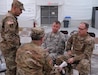 Capt. Dennis Consolver and Sgt. 1st Class John Cunningham, U.S. Army Reserve Soldiers with Army Reserve Medical Command’s 7227th Medical Support Unit, discuss a religious scenario with observer coach/trainers Lt. Col. Jose Nunez and Capt. Cecil Edwards.  The exercise inject will be used to test the 7227th commander’s response to his Soldier’s religious needs.  The scenarios placed on Soldiers within the 7227th are training and validation injects in preparation for the unit’s upcoming mobilization in support of Landstuhl Regional Medical Center’s Deployed Warrior Medical Management Center.  Soldiers assigned to the 7227th MSU, out of Columbia, Missouri, have been working alongside 1st Army Division West’s observer coach/trainers with 4th Battalion (Medical), 393rd Infantry Regiment in North Fort Hood for three weeks in preparation for their upcoming mission.