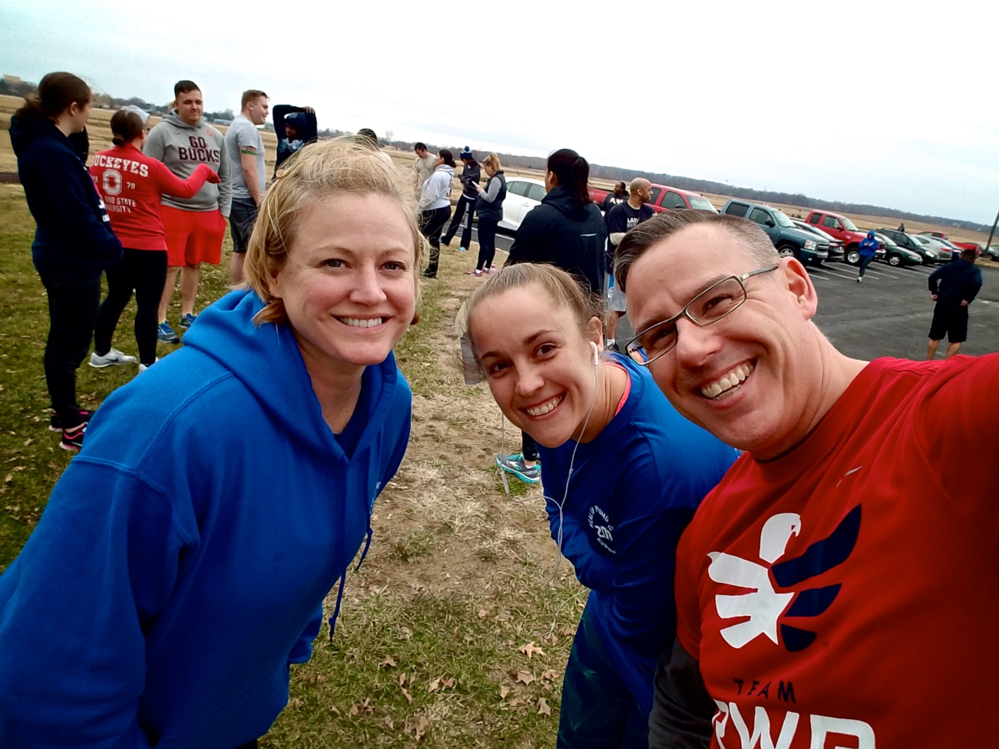 Christopher Parr, 932nd Airlift Wing Public Affairs specialist poses with Heather Braundmeier, Running, left, Clinic guru, and Jennifer Duckett group leader and Team 932nd AW member Feb. 6, 2017, Scott Air Force Base, Illinois.  Parr is documenting his experience with the running clinic in a weekly blog.  (U.S. Air Force photo by Christopher Parr)