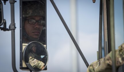 U.S. Army Reserve Cpl. Michael Diffoot, 329th Chemical Company chemical biological warfare specialist, prepares to off load equipment during a hazardous material decontamination exercise on the Port of Miami, Fla. Feb 18, 2017. The exercise was led by Miami-Dade Fire Rescue and U.S. Army North under the supervision of U.S. Northern Command and provided soldiers and first responders the unique experience of operating together in a major metropolitan city. 