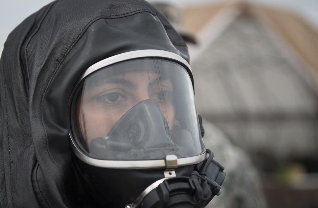 U.S. Army Reserve Spc. Daisy Garcia, 329th Chemical Company chemical biological warfare specialist, prepares decontamination procedures during a hazardous material decontamination exercise on the Port of Miami, Fla. Feb 18, 2017. The exercise was led by Miami-Dade Fire Rescue and U.S. Army North under the supervision of U.S. Northern Command and provided soldiers and first responders the unique experience of operating together in a major metropolitan city.