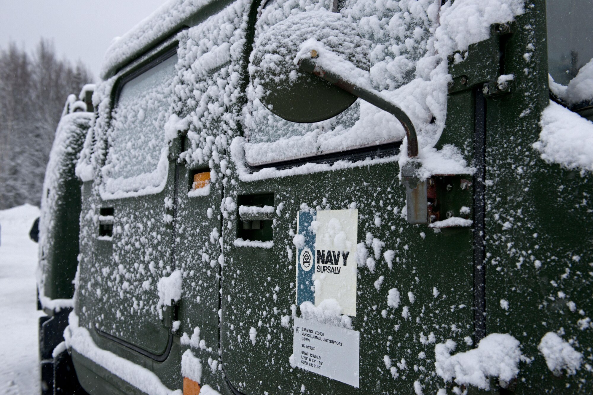 Members of the 611th Civil Engineer Squadron, U.S. Navy Supervisor of Salvage, U.S. Coast Guard, Alaska Department of Environmental Conservation, and the U.S. Environmental Protection Agency, participate in an arctic response training exercise at Sixmile Lake at Joint Base Elmendorf-Richardson, Alaska, Feb. 15, 2017. The training involved learning oil-spill response techniques on the ice and crisis response methods during arctic conditions. 
