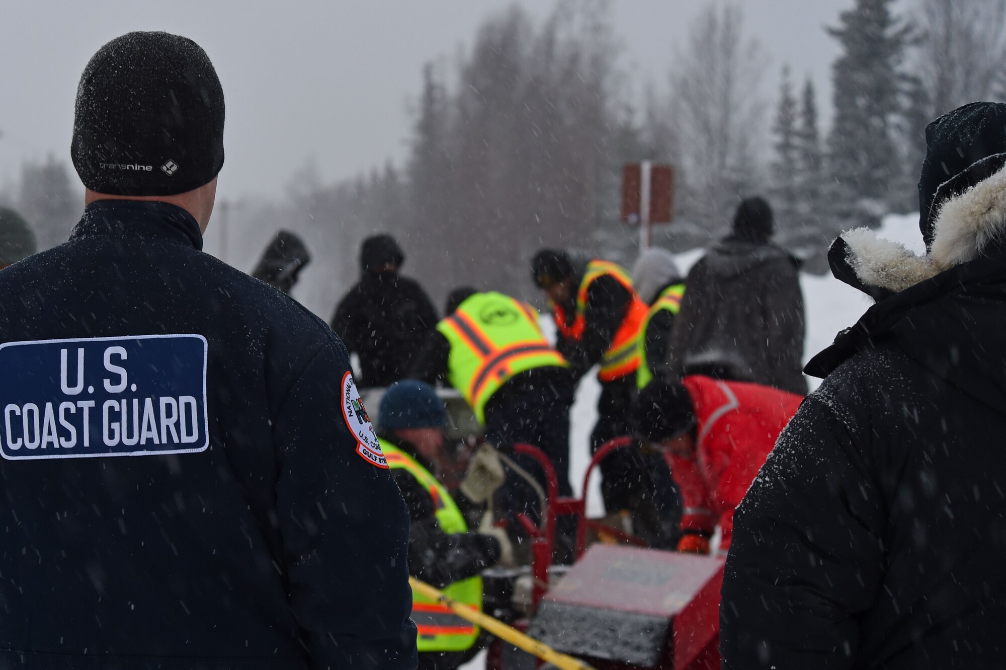 Members of the 611th Civil Engineer Squadron, U.S. Navy Supervisor of Salvage, U.S. Coast Guard, Alaska Department of Environmental Conservation, and the U.S. Environmental Protection Agency, participate in an arctic response training exercise at Sixmile Lake at Joint Base Elmendorf-Richardson, Alaska, Feb. 15, 2017. The training involved learning oil-spill response techniques on the ice and crisis response methods during arctic conditions. 
