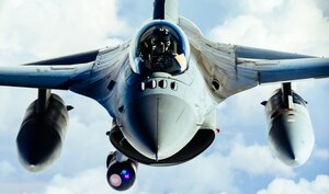 An Air Force F-16 Fighting Falcon refuels from a 340th Expeditionary Air Refueling Squadron KC-135 Stratotanker during operations in support of Operation Inherent Resolve, Feb. 15, 2017. The 340th EARS extended the fight against Islamic State of Iraq and Syria terrorists by delivering fuel to Air Force F-16s, A-10 Thunderbolt II's and a B-52 Stratofortress. Air Force photo by Senior Airman Jordan Castelan