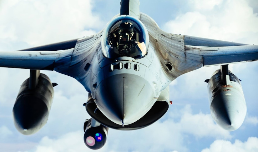 An Air Force F-16 Fighting Falcon refuels from a 340th Expeditionary Air Refueling Squadron KC-135 Stratotanker during operations in support of Operation Inherent Resolve, Feb. 15, 2017. The 340th EARS extended the fight against Islamic State of Iraq and Syria terrorists by delivering fuel to Air Force F-16s, A-10 Thunderbolt II’s and a B-52 Stratofortress. Air Force photo by Senior Airman Jordan Castelan