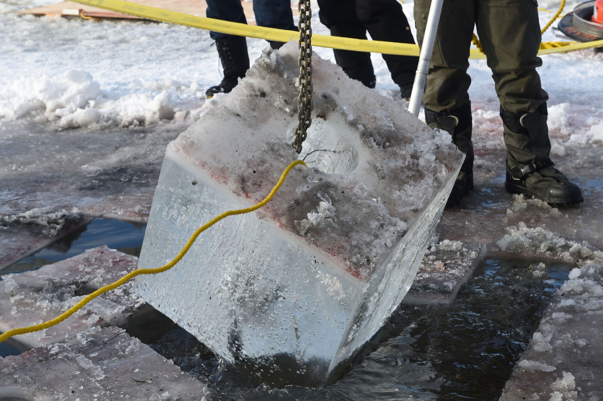 Members of the 611th Civil Engineer Squadron, U.S. Navy Supervisor of Salvage, U.S. Coast Guard, Alaska Department of Environmental Conservation, and the U.S. Environmental Protection Agency, participate in an arctic response training exercise at Sixmile Lake at Joint Base Elmendorf-Richardson, Alaska, Feb. 15, 2017. The training involved learning oil-spill response techniques on the ice and crisis response methods during arctic conditions. 