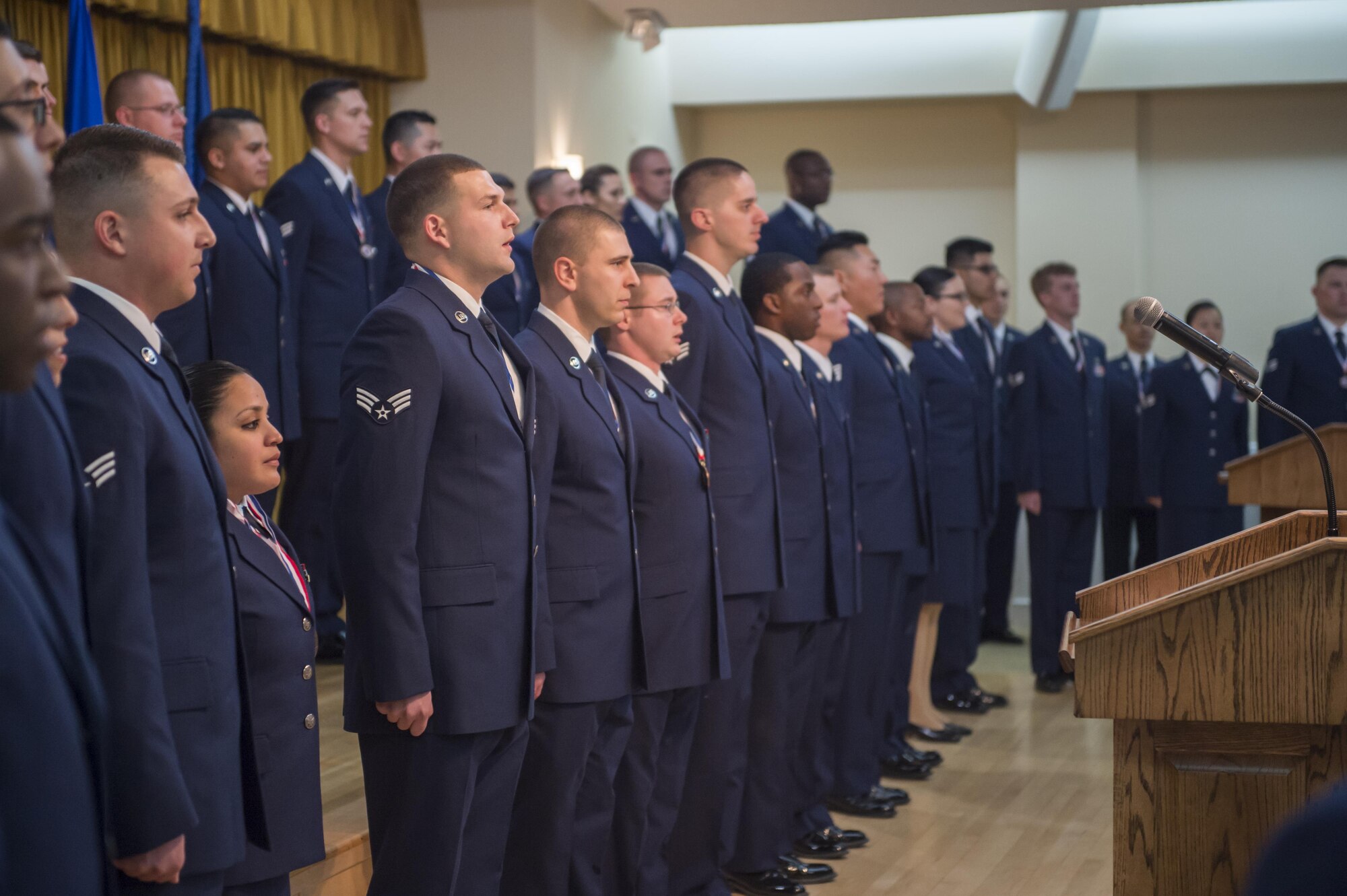 Graduates of Airman Leadership School Class 17B sing the Air Force song Feb. 9 at Club Muroc. (U.S. Air Force photo by Kyle Larson)
