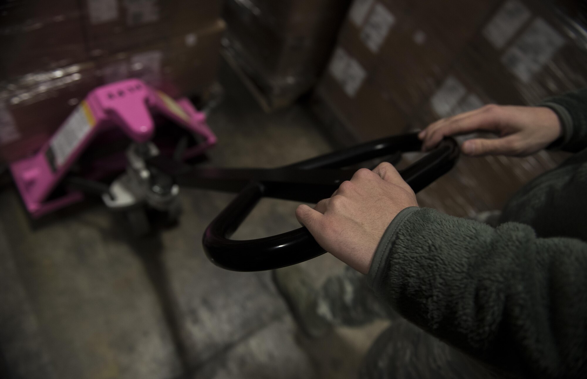 Airman 1st Class Josiah Massari, moves a pallet in the 92nd Communication Squadron warehouse Feb. 17, 2017, at Fairchild Air Force Base. As a base equipment custodian Massari handles coordination for receiving assets and accountability for all items in the warehouse. (U.S. Air Force photo/ Airman 1st Class Sean Campbell)