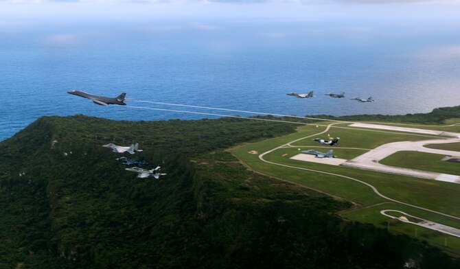 Aircraft from the United States, Japanese and Australian air forces fly in formation during exercise Cope North 2017 off the coast of Guam, Feb. 21, 2017. The exercise includes 22 total flying units and more than 2,700 personnel from three countries and continues the growth of strong, interoperable relationships within the Indo-Asia Pacific Region through integration of airborne and land-based command and control assets. (U.S. Air Force Photo by Staff Sgt. Aaron Richardson)