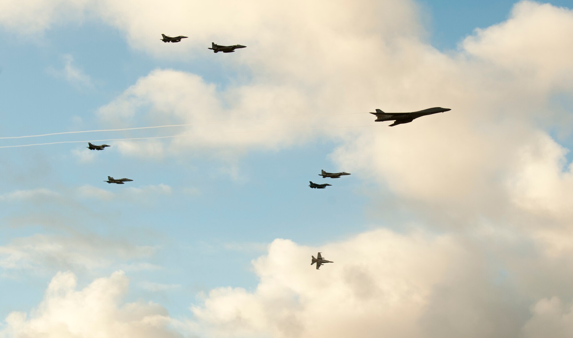 Aircraft from the United States, Japanese and Australian air forces fly in formation during exercise Cope North 2017 off the coast of Guam, Feb. 21, 2017. The exercise includes 22 total flying units and more than 2,700 personnel from three countries and continues the growth of strong, interoperable relationships within the Indo-Asia Pacific Region through integration of airborne and land-based command and control assets. (U.S. Air Force Photo by Senior Airman Keith James)