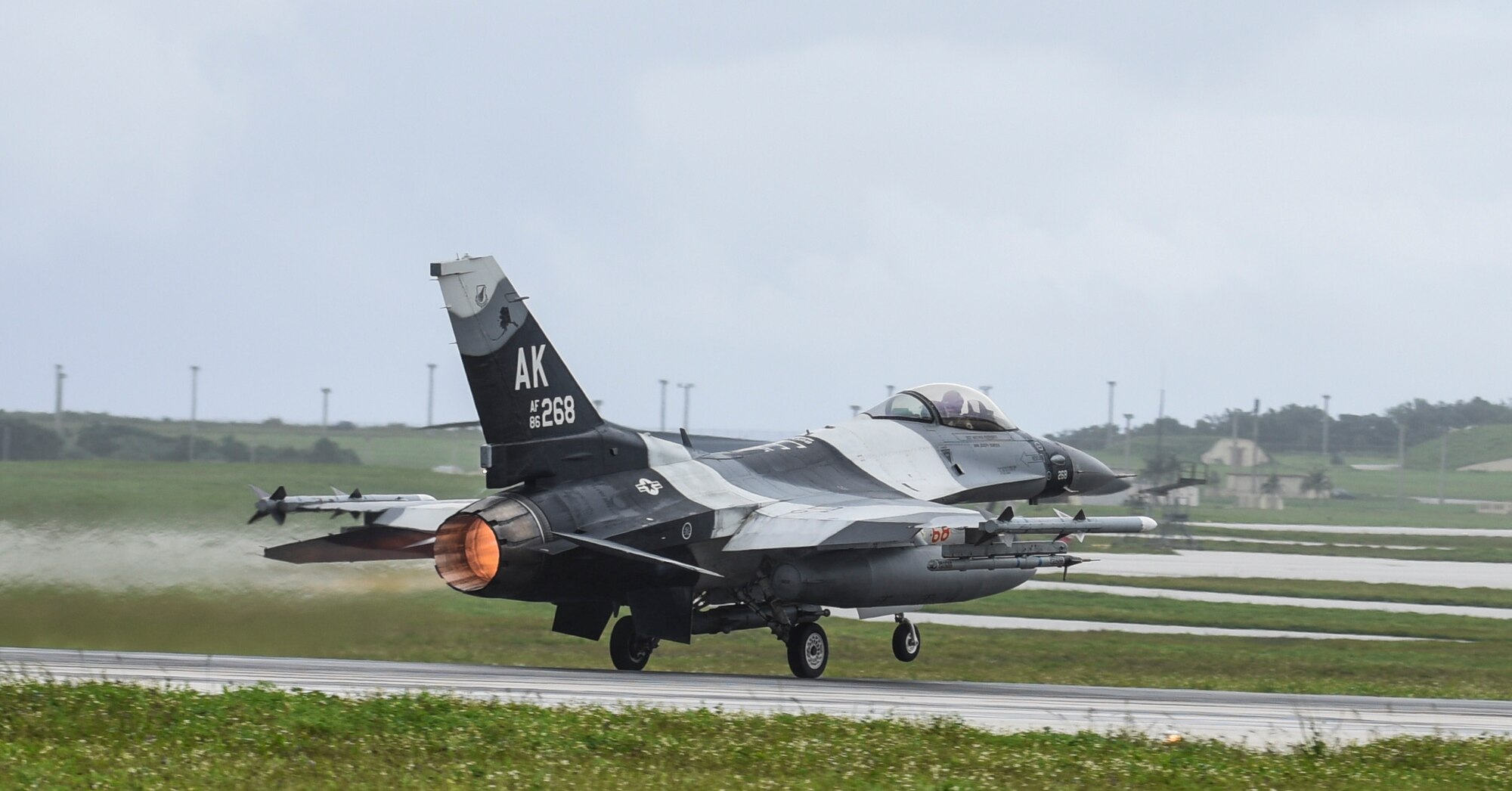 A U.S. Air Force F-16 Fighting Falcon assigned to the 18th Aggressor Squadron, Eielson Air Force Base, Alaska, takes off during Exercise Cope North 2017 at Andersen Air Force Base, Guam, Feb. 16, 2017. The exercise is designed to increase combat readiness between the United States, Australia and Japan, including fighter versus fighter air combat tactics training and air-to-ground strike mission training over the Farallon de Medinilla range 160 nautical miles north of Guam. (U.S. Air Force photo by Tech. Sgt. Richard P. Ebensberger/Released)