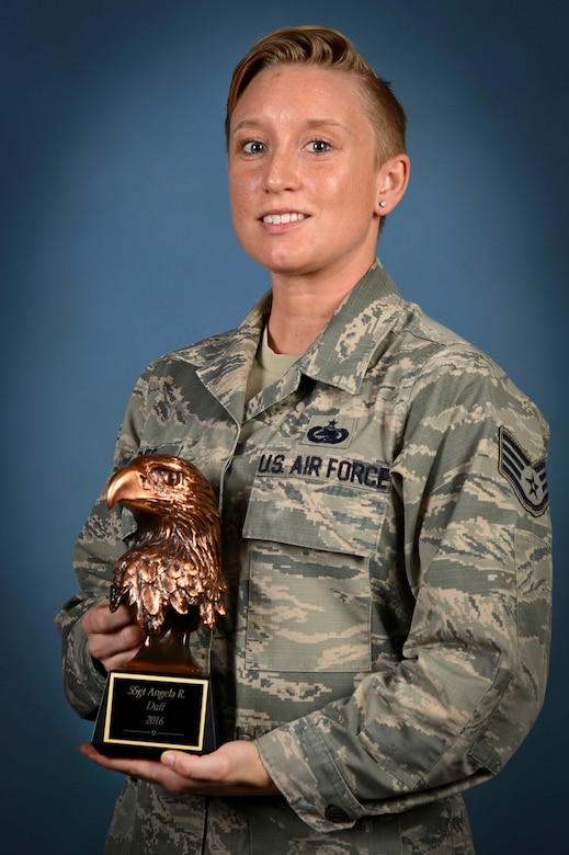 U.S. Air Force Staff Sgt. Angela Duff, 20th Logistics Readiness Squadron quality assurance evaluator, holds her 2016 Military Citizen of the Year award at Shaw Air Force Base, S.C., Feb. 14, 2017. Duff received recognition from the Greater Sumter Chamber of Commerce Military Affairs Committee for her volunteer contributions to on- and off-base communities. (U.S. Air Force photo by Airman 1st Class Christopher Maldonado)