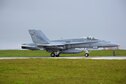 A Royal Australian Air Force F/A-18A Hornet assigned to No. 3 Squadron, Royal Australian Air Force Base, Williamtown, Australia, lands during Exercise Cope North 2017 at Andersen Air Force Base, Guam, Feb. 16, 2017. Cope North is a long-standing Pacific Air Forces-led exercise designed to enhance multilateral air operations between the U.S. Air Force, U.S. Navy, Japan Air Self-Defense Force and Royal Australian Air Force. (U.S. Air Force photo by Airman 1st Class Christopher Quail/Released)