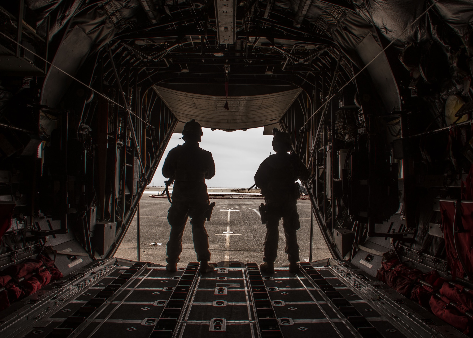 Staff Sgt. Ryan Malicki, left, and Senior Airman Ryan Donato, right, 386th Expeditionary Security Forces Squadron Fly-Away Security Team members, monitor the flightline during a FAST drill at an undisclosed location in Southwest Asia, Feb. 5, 2017. These teams are used when additional security is required at the aircraft’s destination. (U.S. Air Force photo/Senior Airman Andrew Park)